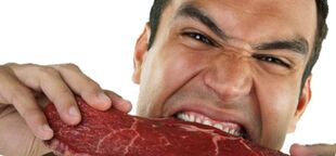 A man eats meat to increase potency